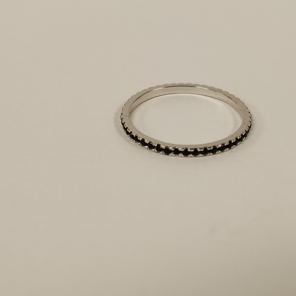 Black and 925 sterling silver ring.